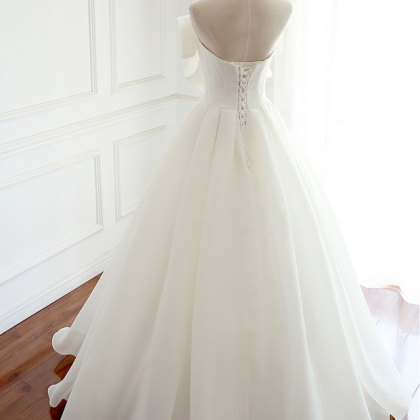 Bow Accent Strapless Chiffon Wedding Gown..