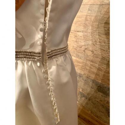Ivory Strapless Satin Waist Embellished Gown..
