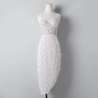 White spaghetti strap feather dress..